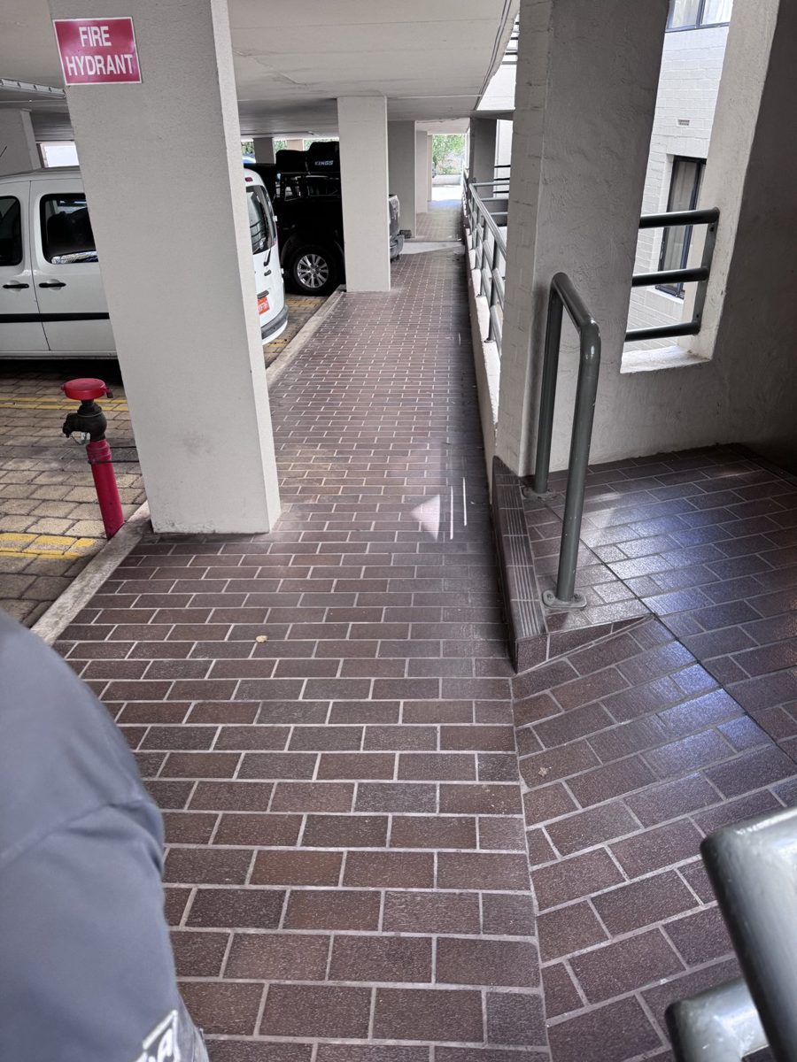 Original tiled walkway at 2 Goderich Street before remedial waterproofing works