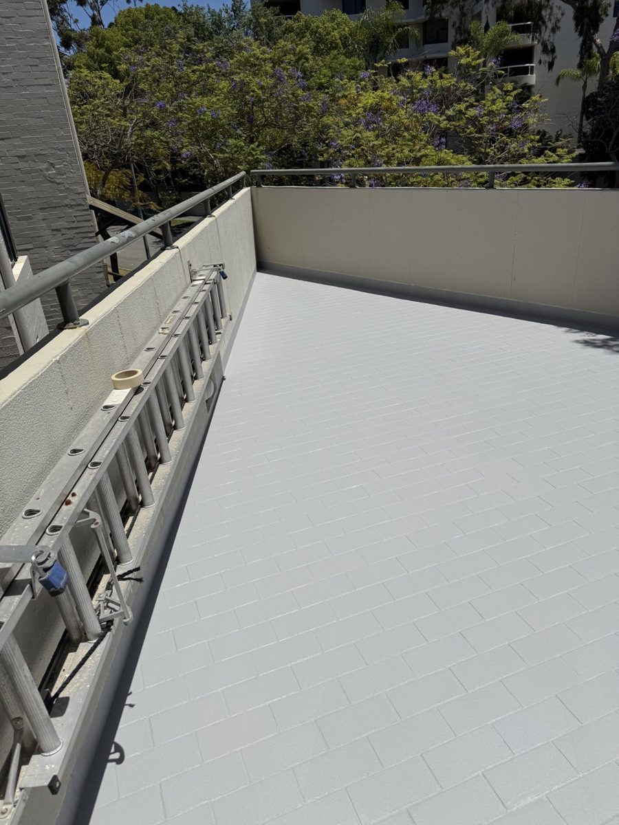 Finished over-tile waterproofing system on balcony at 2 Goderich Street East Perth